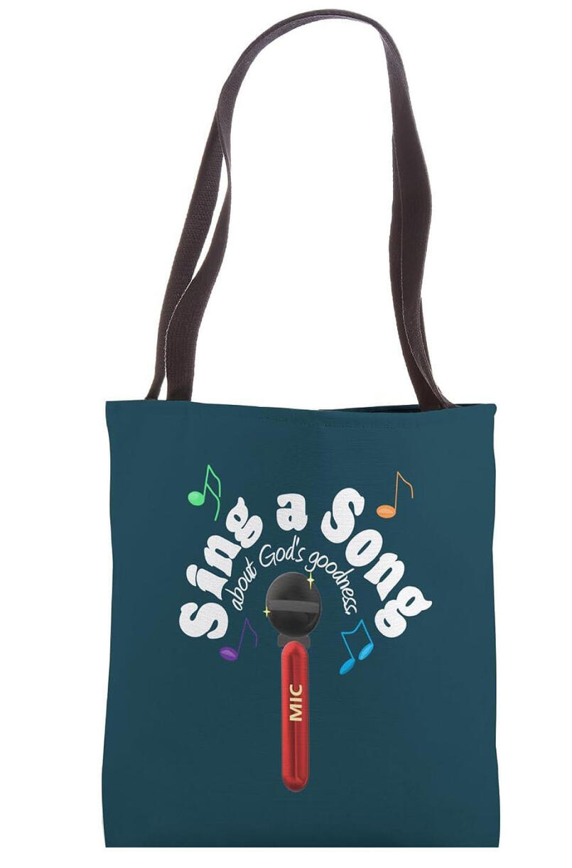 "Declare His praise with the 'Sing A Song About God's Goodness' Tote Bag. Featuring a vibrant microphone and colorful music notes, it’s the perfect accent for the believer who loves to make music unto the Lord."