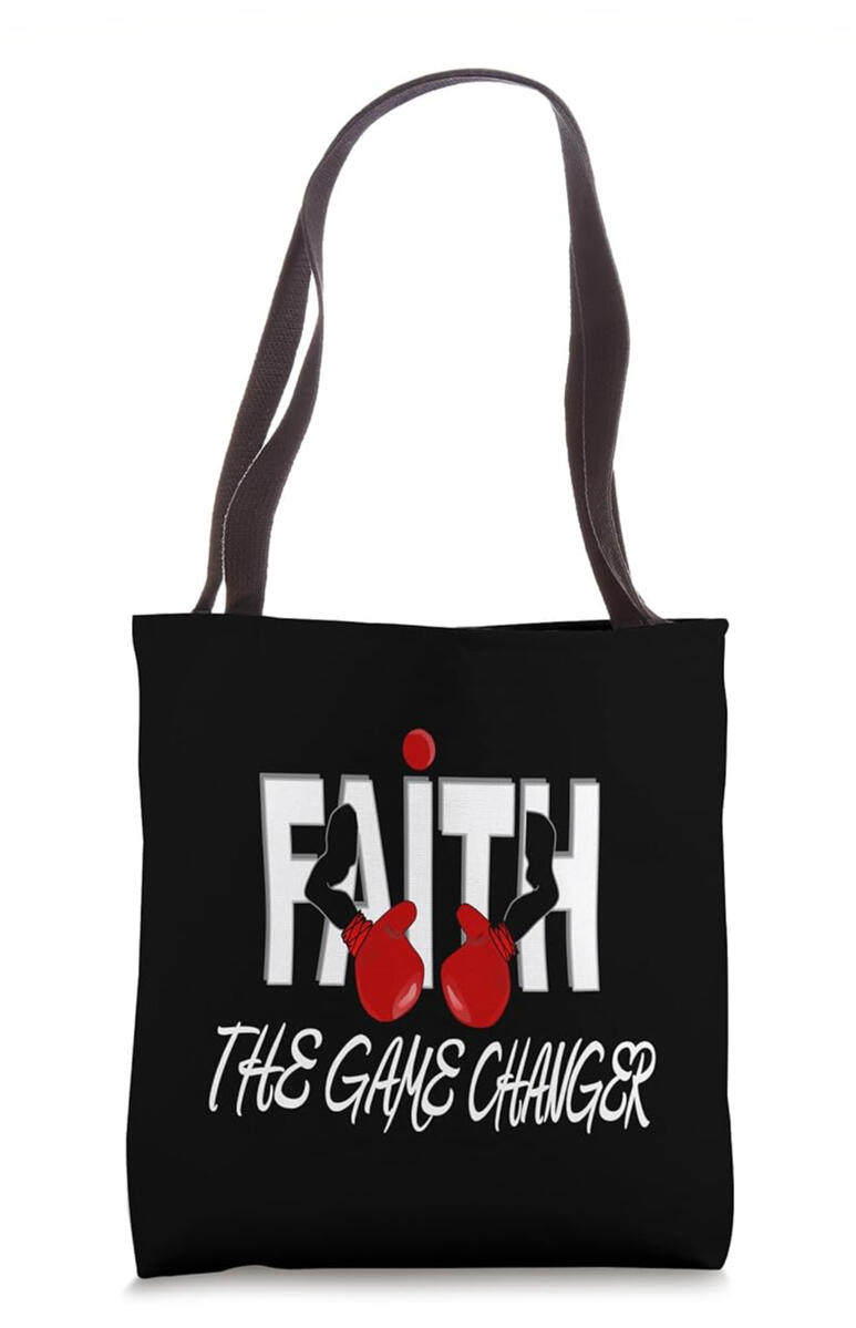 Faith The Game Changer Christian Tote Bag featuring bold white lettering that spells "FAITH" with extended arms wearing striking red boxing gloves, symbolizing the victory that come through faith. This inspirational tote is perfect for carrying your Bible,