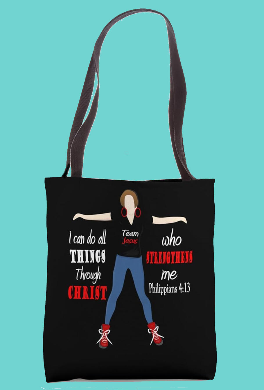 I Can Do All Things Through Christ Who Strengthens Me – Philippians 4:13 Christian Tote Bag features an inspiring illustration of a woman with her arms outstretched, wearing a "Team Jesus" shirt as a bold expression of faith.