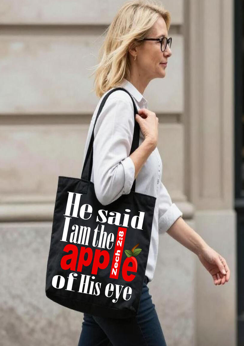 He said, "I am the apple of His eye." This Christian tote bag artistically displays the word "APPLE," with the letter "E" shaped like an apple, symbolizing how cherished and special we are in His eyes.